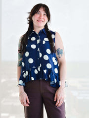 Polka Dot Sleeveless Button Up Blouse With Ruffle Hem